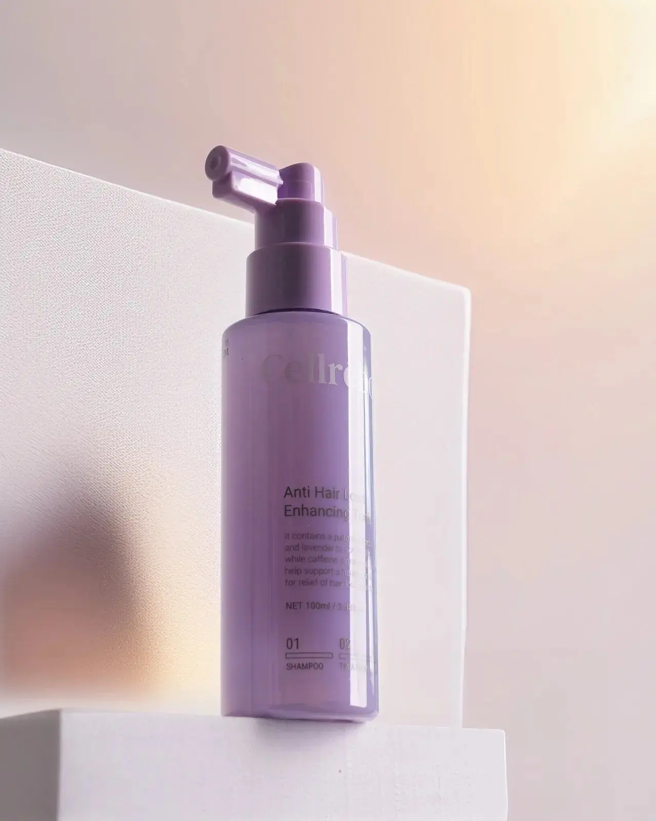 CELLREBORN lavender scalp care packaging (shampoo, treatment and tonic) styled in soft light