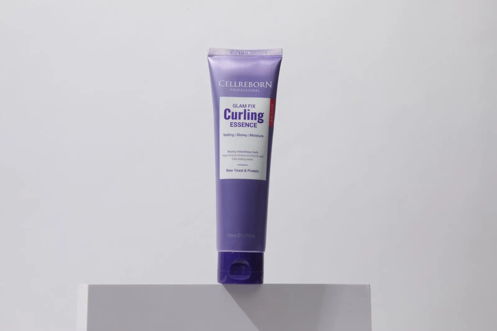 Athens GLAMFIX Curling Essence, styled product photograph