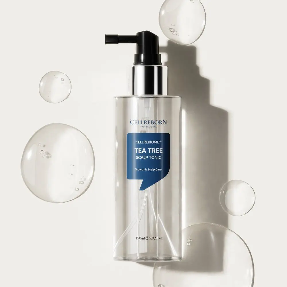 Cellrebiome Tea Tree Scalp Tonic bottle with clear gel bubbles and a soft shadow on a white surface