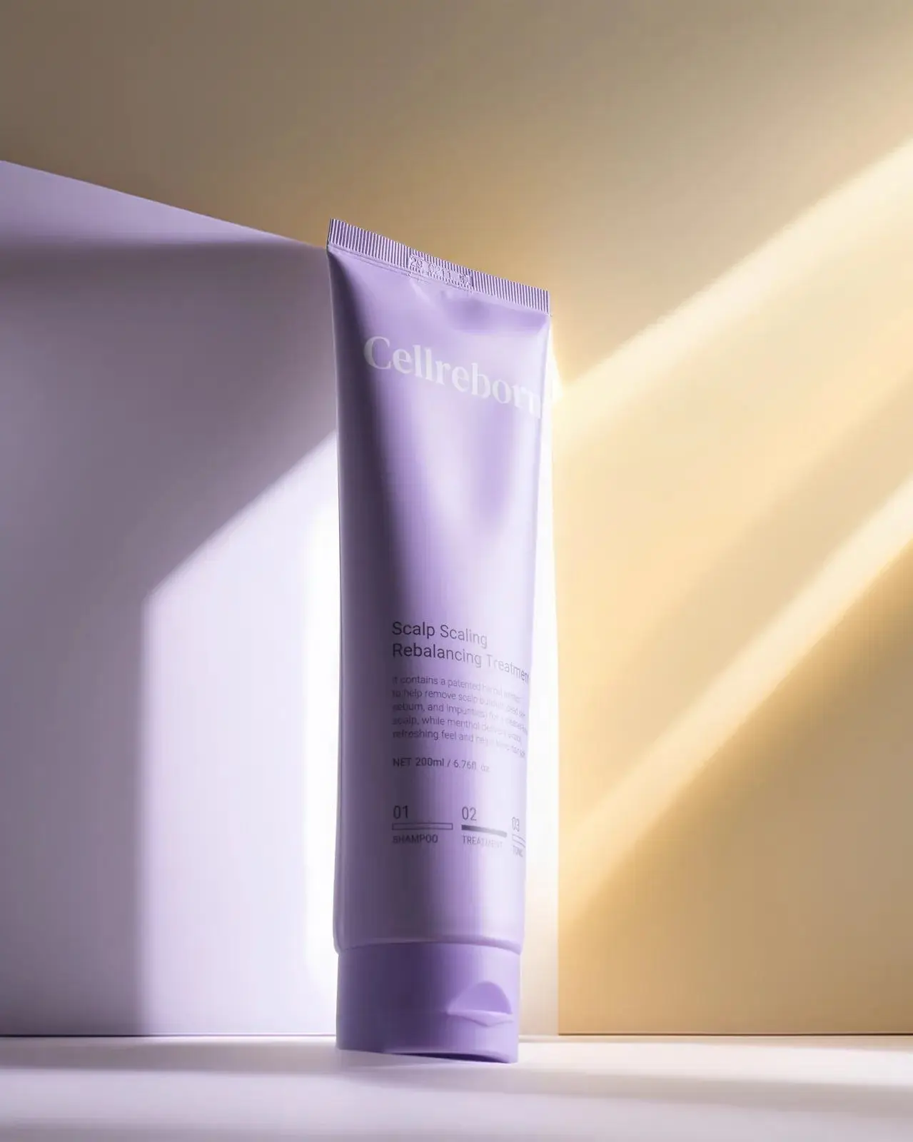 CELLREBORN lavender scalp care packaging (shampoo, treatment and tonic) styled in soft light