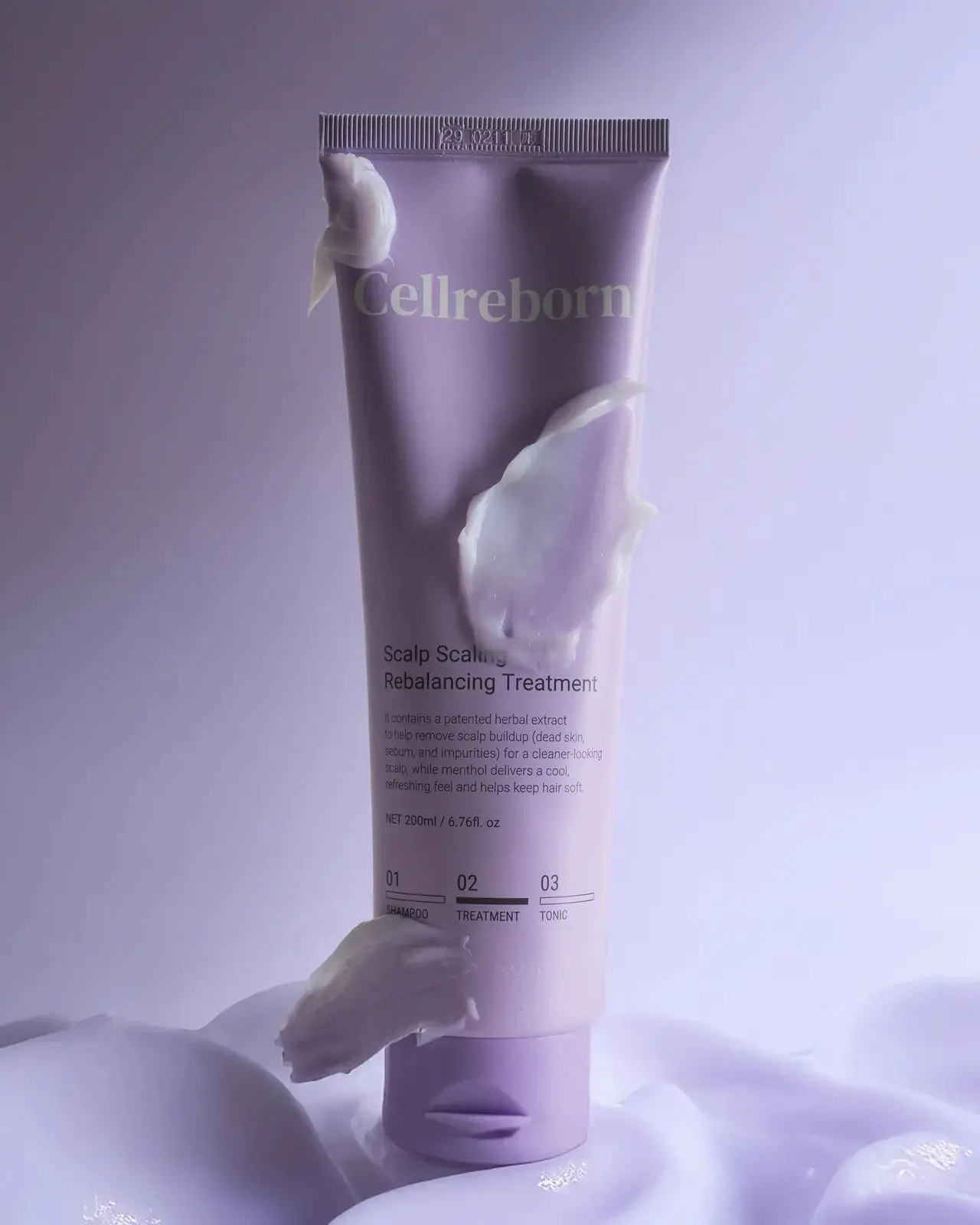 CELLREBORN lavender scalp care packaging (shampoo, treatment and tonic) styled in soft light