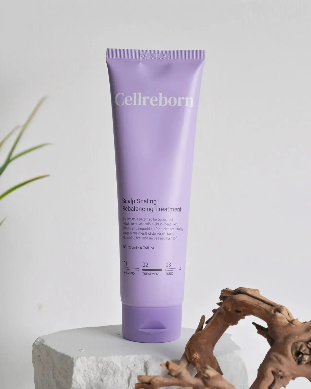 CELLREBORN lavender scalp care packaging (shampoo, treatment and tonic) styled in soft light