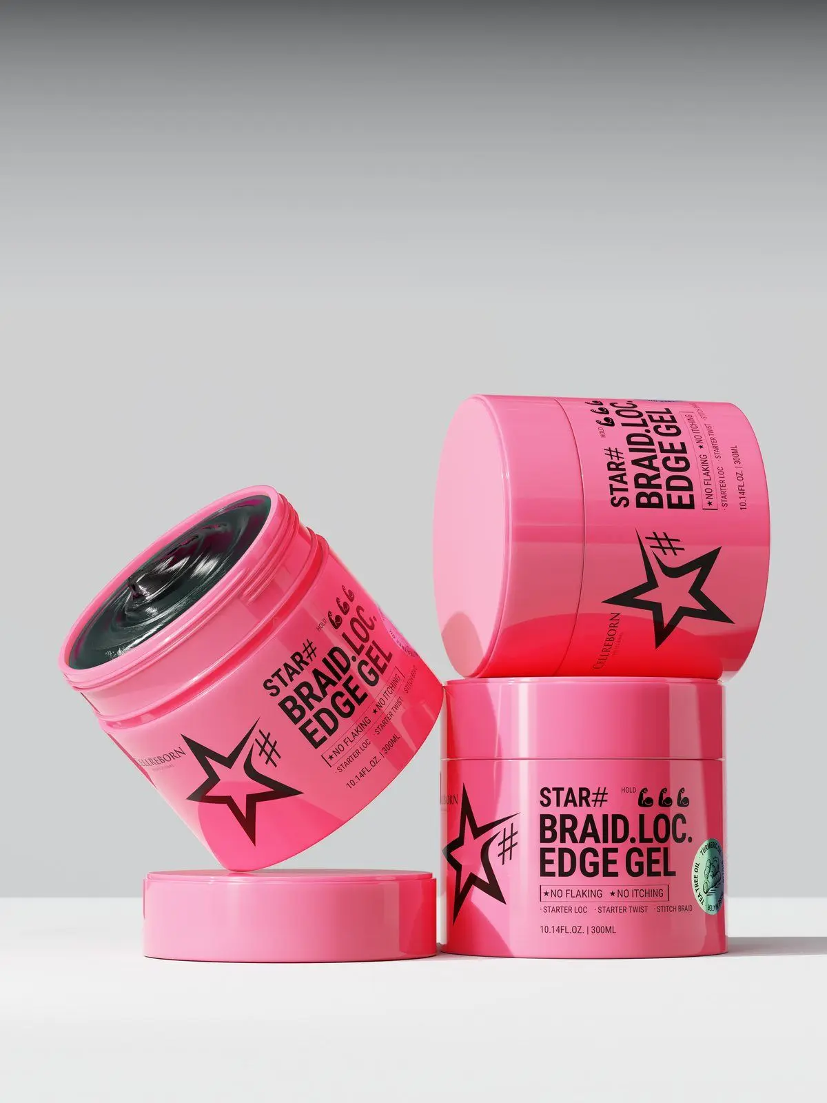 Pink CELLREBORN STAR# Braid Loc Edge Gel jars stacked with one lid off on a white ledge